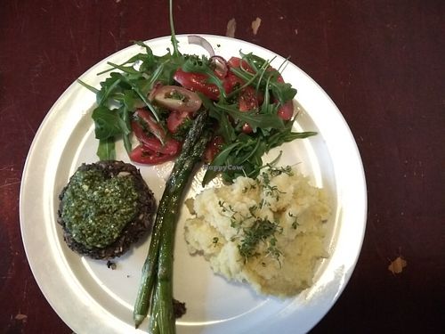 Main dish : grilled greens, black beans burger with pesto, mashed potatoes, asparagus, cherry tomatoes salad (Vegan) at Robin Food in Amsterdam