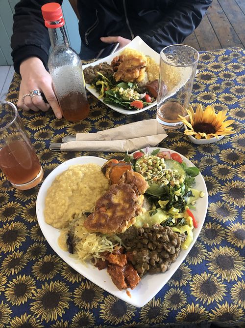 A bit of everything healthy on a love heart plate   at LoveGift Vegan Cafe in South East London