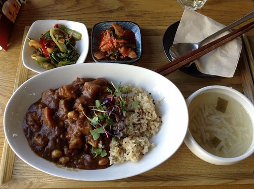 Curry dish plus the delicious ever present sidekick banchan! at Slobbie in Seoul