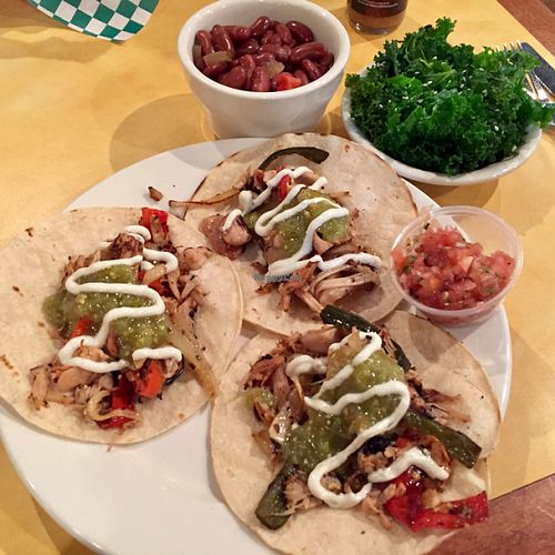 ";Jack Fruit Carnitas Tacos"; with a side of red beans &a rice, and steamed kale.  at Bean Vegan Cuisine in Asheville