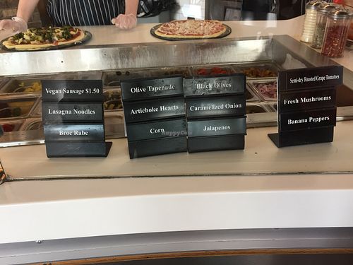 Vegan sausage is the only item costing extra  at Pi Craft Pizza in Henrietta