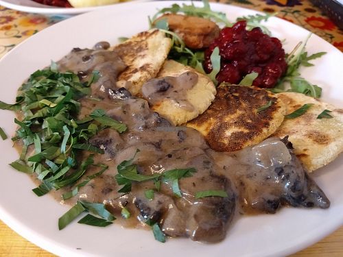 Potato pancake with mushroom sauce at Vege Bistro - Polish Vegan Food in Warsaw