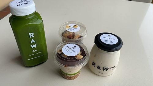 Dale kale juice, protein bites, carawmel peanut parfait & coconut yogurt   at Raw Co. Juicery and Food in Escazu