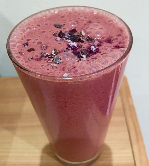 Morning smoothie - cherries, banana, raw cacao, vanilla powder, mucuna, maca, home made almond milk and love❤️ Topped with cacao nibs and purple cornflour. Delicious  at The Health Workshop in Ashby De La Zouch