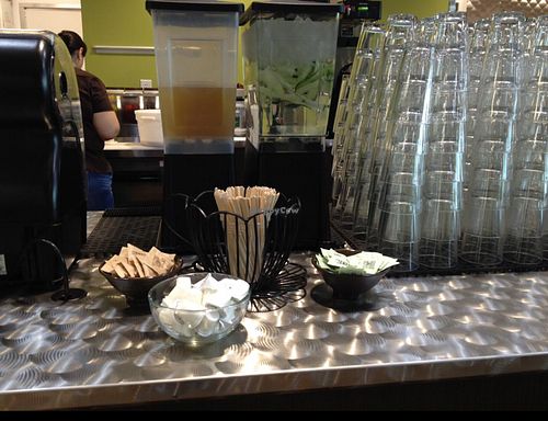 condiment counter with cucumber water & tea at Nourish in Tempe