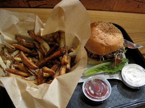 OVEN-BAKED FRIES. Golden potatoes, lemon juice, olive oil, sea salt, signature spices.

I really like the fries, but sometimes they are a little dry.

Burger

Vegan Mayo and ketchup. at Copper Branch - Rene Levesque in Montreal
