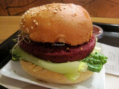 COPPER BURGER. Beet, lentils, organic brown rice, maple syrup, Dijon vegenaise, organic miso, caramelized onions, alfalfa sprouts, lettuce.

This burger is pretty good. at Copper Branch - Rene Levesque in Montreal