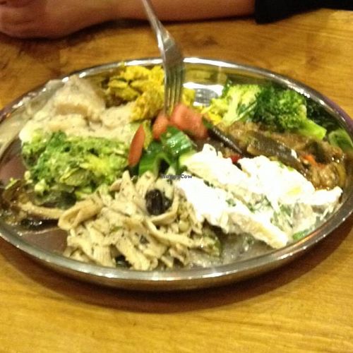 a huge plate with choses from the buffet at Vantra Vitao in London