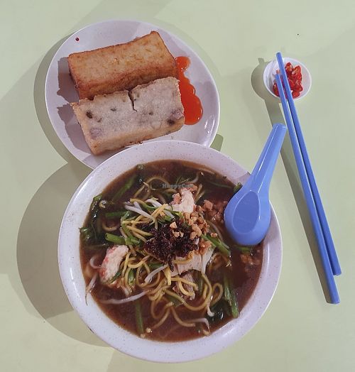 Prawn noodle and carrot cake.
Photo by Sam Lama at He Hua Vegetarian 荷花素食 in Central Singapore
