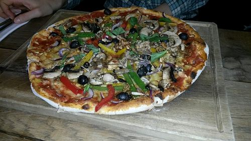 VEGAN PIZZA - TOMATO, PEPPERS, RED ONION, MUSHROOMS, OLIVES, BASIL, OREGANO, PINE NUTS at The Herb Garden in Newcastle Upon Tyne