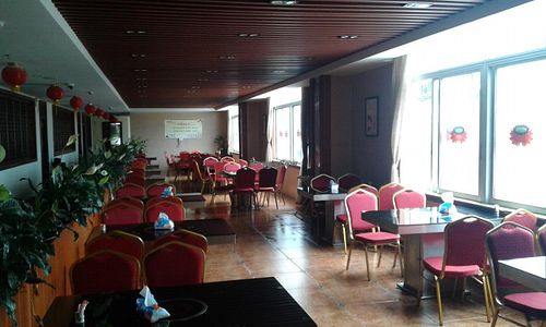 Tea and lunch area. Each table has a heater in the middle for a pot of water. For intense tea sessions that the Chinese lise to have. at Heshan Vegetarian in Zengcheng