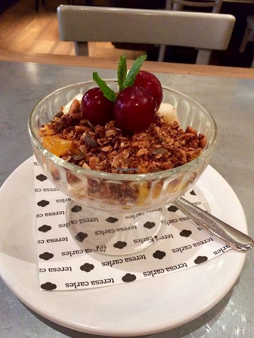Fresh fruit and raw granola soya yogurt parfait (vegan breakfast item). at Teresa Carles Cocina Vegetariana in Barcelona