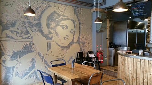 Beautiful wall crafted art at Anna Loka in Cardiff