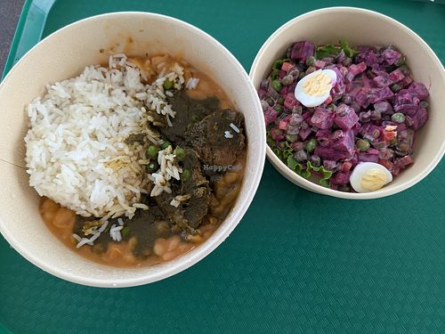 Left: gluten, White rice, beans. Right: mixed salad with beets peas and green beans at Comedor de la Clinica Good Hope in Lima