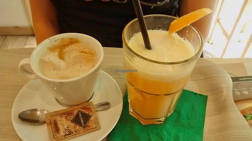 Cappuccino and fresh juice at Universo Vegano in Florence