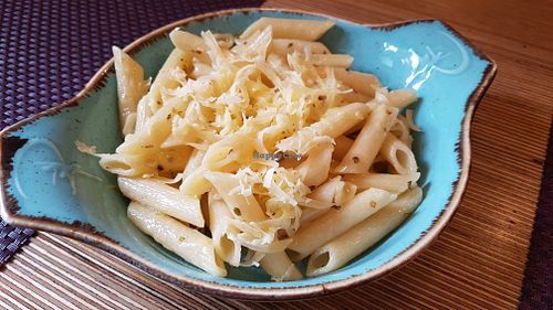Side: pasta with vegan cheese at Bhajan Cafe in Riga