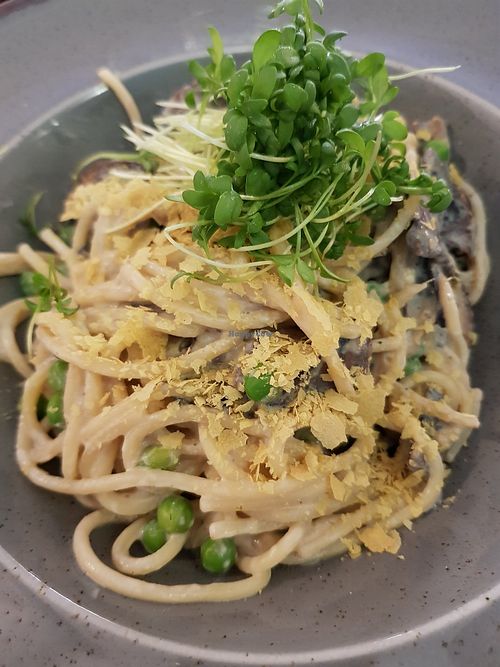 Spaghetti Carbonara: creamy cheese + green peas + mushrooms + green DELICIOUS! at Bhajan Cafe in Riga
