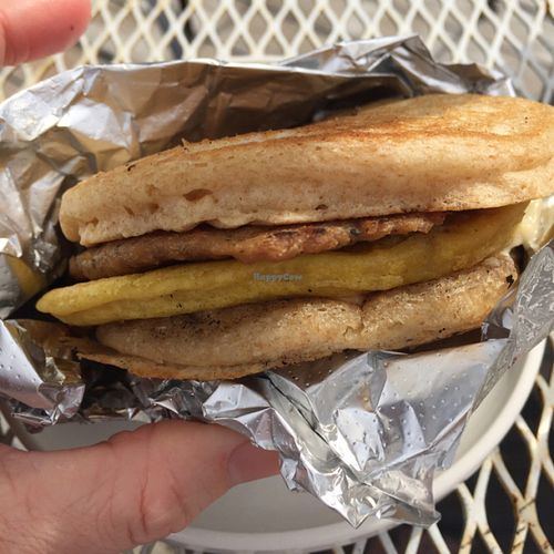 Sunday brunch pancake 'egg' chickpea patty with soy 'sausage.' at Diggity Doughnuts in Charleston
