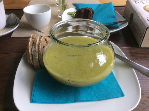 Potato an ?Broccoli soup, with chocolate cake half eaten  behind! at ba.um in Hamburg