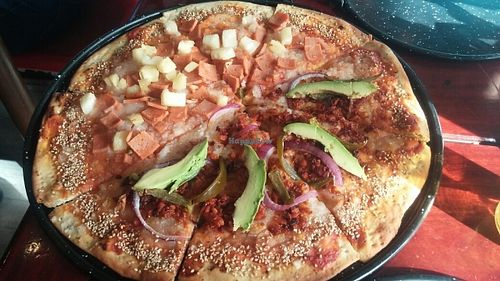 half Hawaiian half Mexican pizza  at U.to.pi.a in Mexico City
