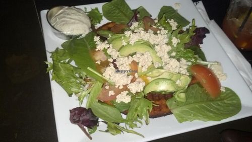 Vegan AGT waffle (avocado, greens, tomato) with vegan dilly sauce. at Melt in St Louis