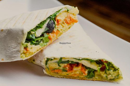 Hummus wrap (with grated carrot, black olives, cucumber, ruccola and pesto). at The Goat Herder in Budapest