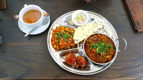 Thali and tea (bought separately). Tea comes in a Pot. Tasty and sufficiently spicy! at Ahimsa Vegan Restaurant and Club in Wroclaw