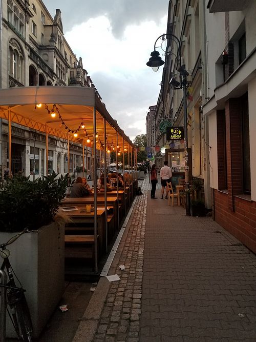 Outdoor seating at Ahimsa Vegan Restaurant and Club in Wroclaw