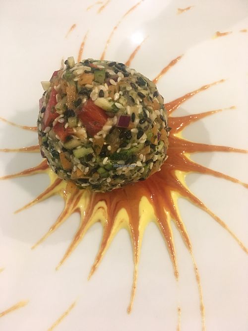 Vegan world: chickpea ball sprinkled with seeds at O'Vita in Parma