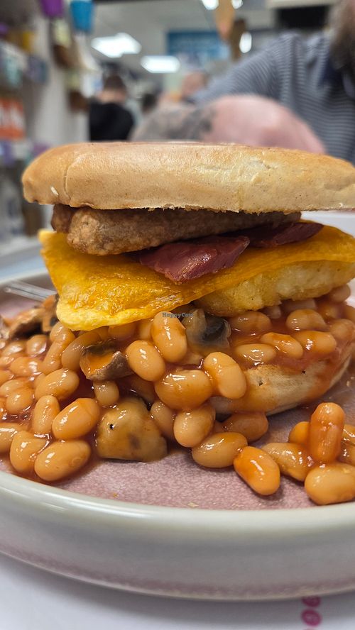 Breakfast bagel - beans, mushrooms, hash browns, cheese, vegan b*con and sausages at Blondes in Cottingham