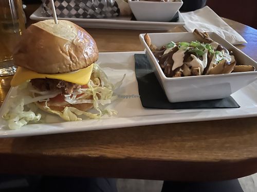 Chicken club, and the DELICIOUS poutine  at The Buckingham in Edmonton