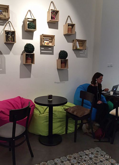 Cozy seating area at The Raw Deli in Prague