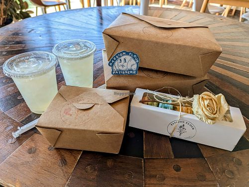 Our full take-out order, including gift box of macarons, two Lavender Lemonades, and a cute branded sticker! at Passion Flour Patisserie in Salt Lake City