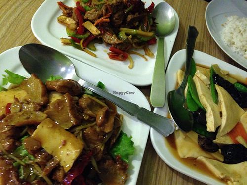 tofu with black mushrooms, ginger chicken and beef with peppers  at Vege Saveurs in Paris
