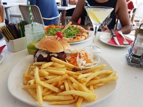 Vegan burger and pizza with cocktails at La Plage in St Julians