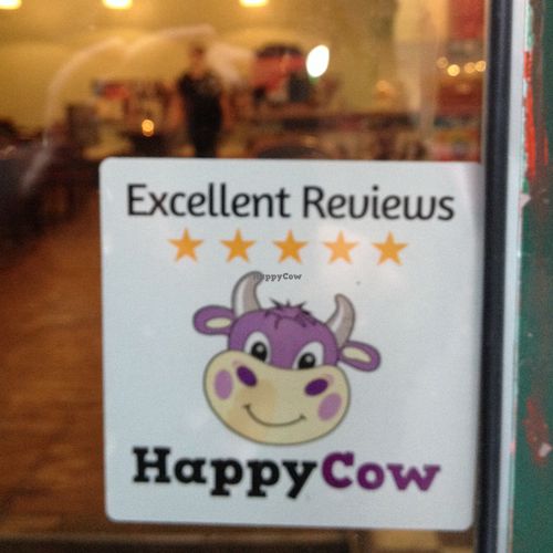 Happy Cow Sticker on display  at The Bohemian in Newcastle Upon Tyne