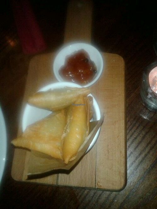 Mini vegetable samosas and dip to accompany biryani baji salad at The Bohemian in Newcastle Upon Tyne
