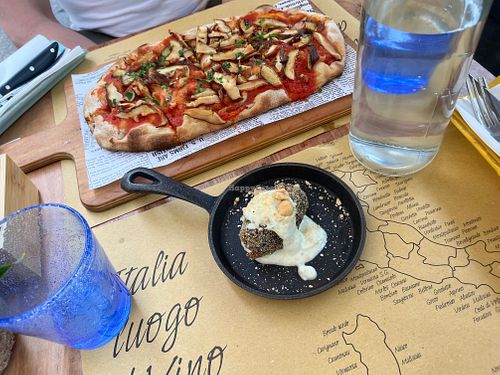 Mushroom pizza and rice/cheese sauce starter at Buddy VEGGY in Rome