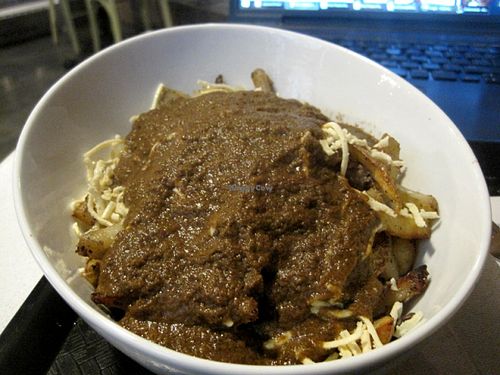 This is the vegan poutine with portobello miso sauce. 
This poutine doesn't taste like a standard poutine. It is rather good, but not the best vegan poutine you can get in Montreal. at Copper Branch - 600 Maisonneuve W/O in Montreal