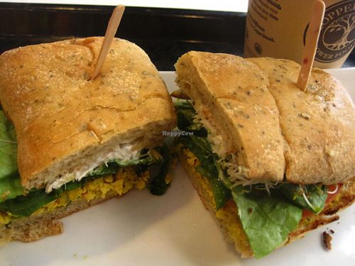 TOFU SCRAMBLE SANDWICH on Organic Kamut Ciabatta (Organic seasoned tofu, red peppers, onions, lettuce, tomato, alfalfa sprouts, vegenaise). It is quite good. at Copper Branch - 600 Maisonneuve W/O in Montreal