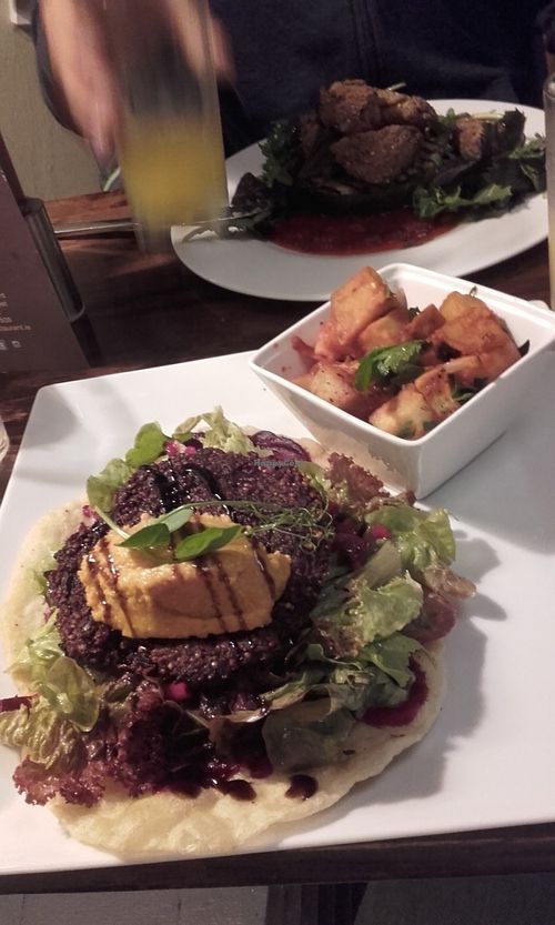 quinoa/beetroot Patty with Indian-spiced Potatoes, green salad and flatbread with carrot-Hummus, Delicious! at Momo Restaurant in Waterford
