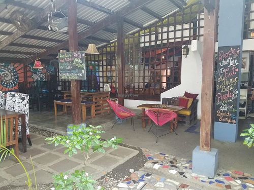 Outside seating at Green Room Cafe in Jaco