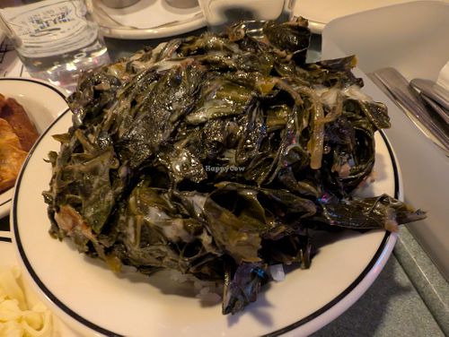 Collards over rice at Superiority Burger in New York City