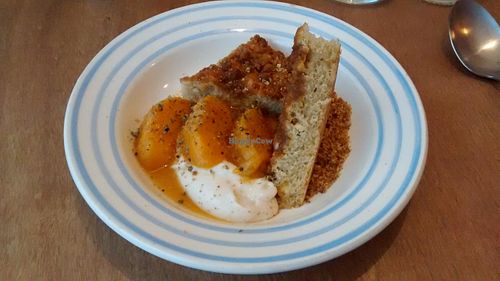 Crumble cake, snacked peaches, jasmine cream, South African basil at Dune in Paris