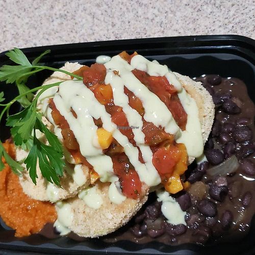 Breaded roasted green tomatoes with pumpkin puree, refried black beans, fruit salsa, and avocado ranch. at Body & Soul Healthy Meal Plans in Fort Myers