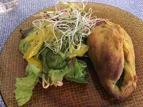 A savoury pastry, plus an add-on side salad. at Hunaja Cafe in Helsinki