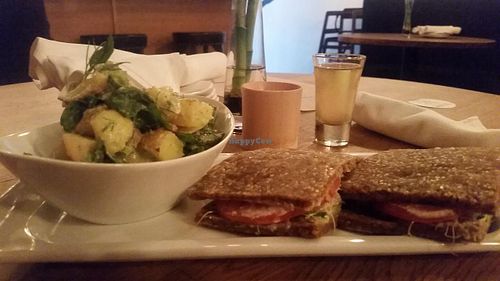 Tomato Seed  Bread Sandwich with potato salad with zend shot and apple juice at Zend Conscious Lounge in Vancouver