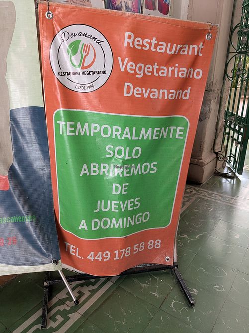 Sign at the doorway in August. 2026 at Devanand in Aguascalientes