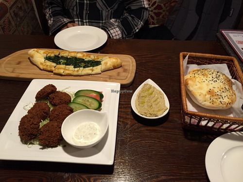 Falafel, spinach pizza, hummus and Turkish bread at Truva Turkish Restaurant in Yokohama