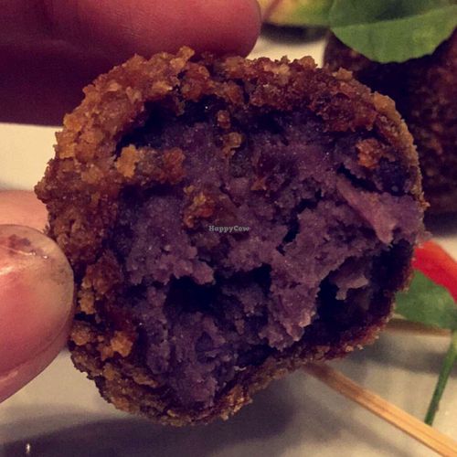 crispy purple yam cake at Herban Fix Vegan Kitchen in Atlanta